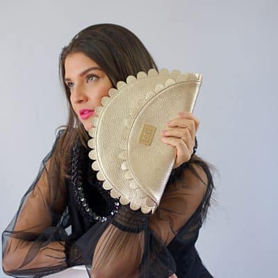 Daisy clutch in gold leather